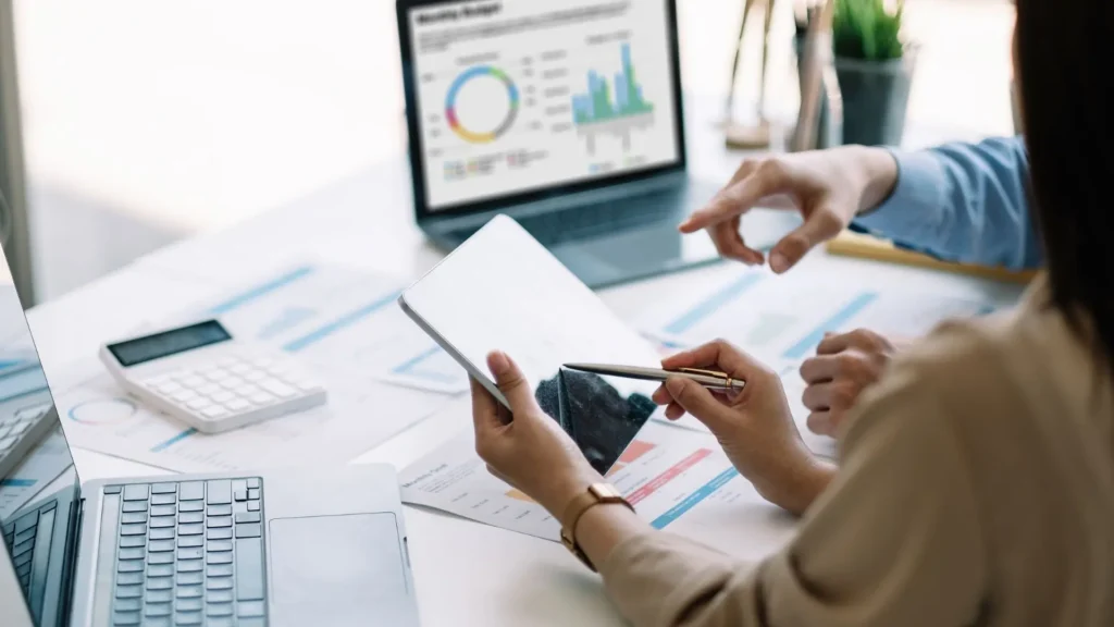 A modern accounting advisory firm using an all-in-one CRM platform with integrated SMS, website chat, pipeline management, and client communication tools displayed on collaborative dashboards, professional team environment, clean modern office, premium SaaS branding aesthetic, realistic lighting and business growth atmosphere